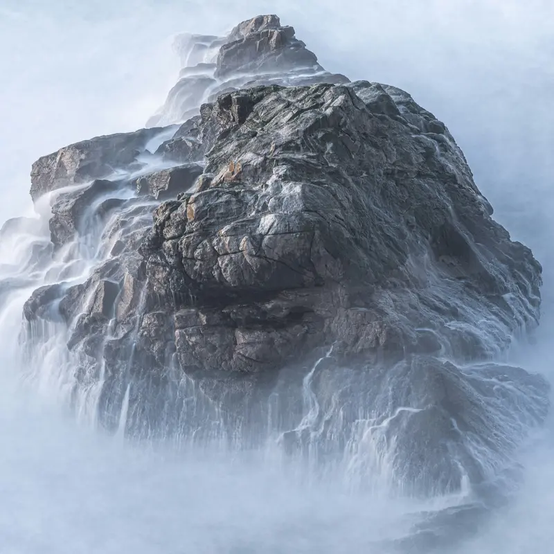 Craggy Sea Rock in Swirling Ocean Mist Jigsaw Puzzle