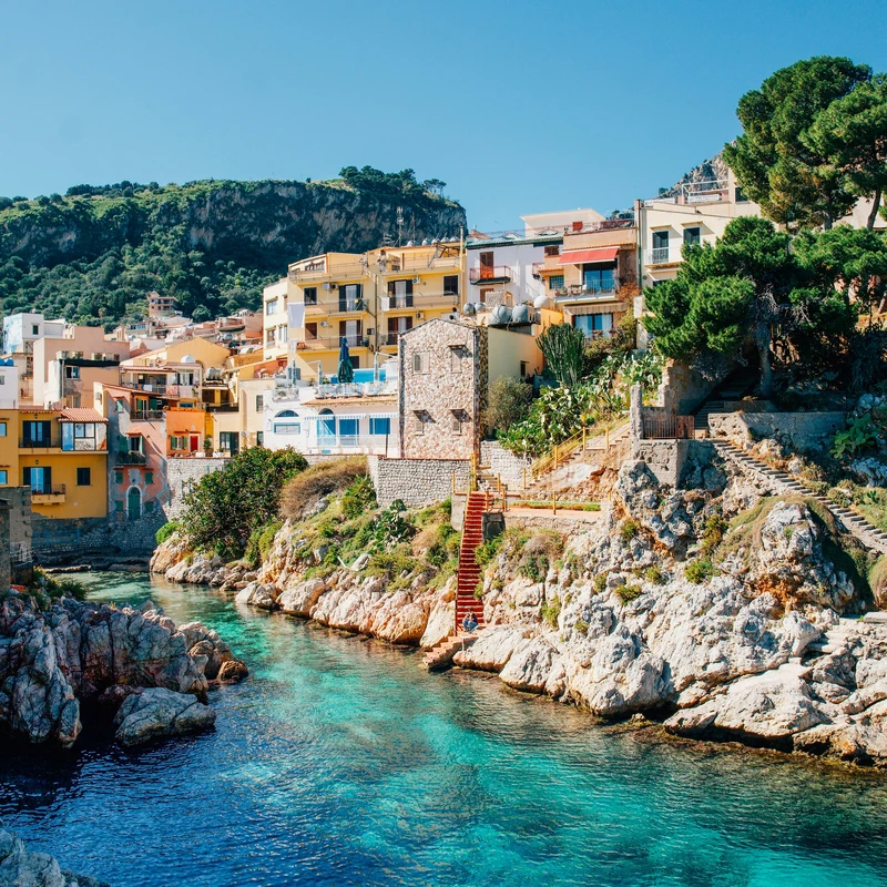 Colorful Sicilian Village on Crystal-Clear Cove Jigsaw Puzzle