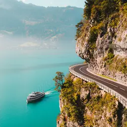 Boat on Lake Thun Along Swiss Cliffside — Travel jigsaw puzzle